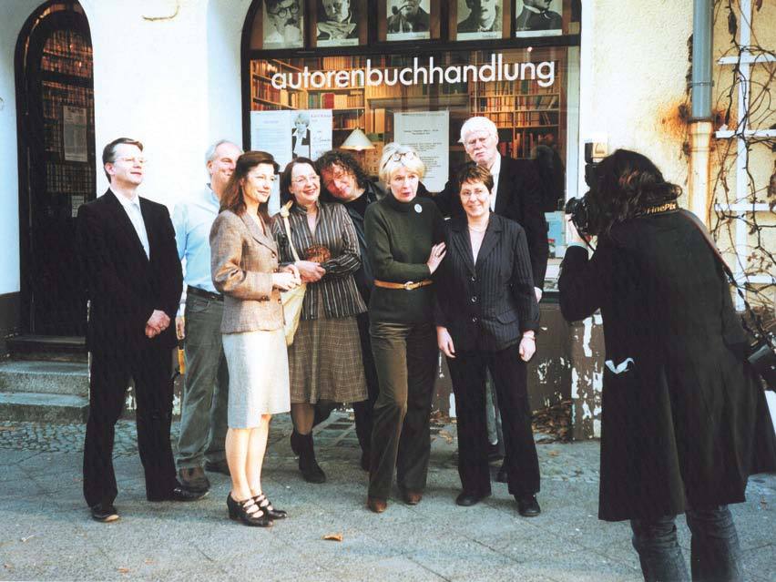 A group of authors who co-own Autorenbuchhandlung outside the bookshop, 2006.