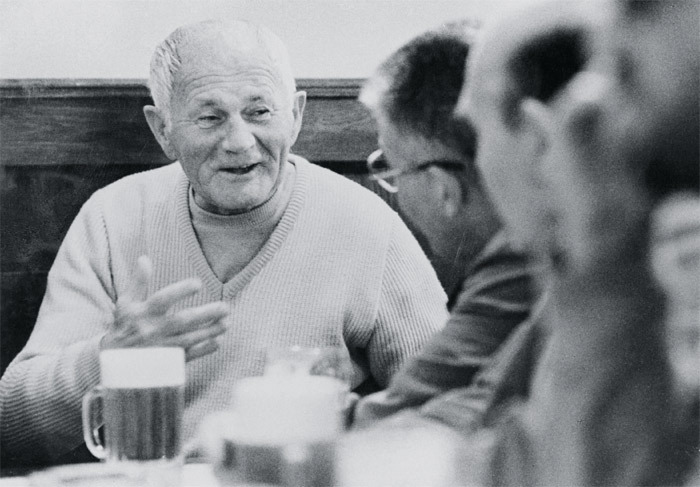 Bohumil Hrabal with friends at his favorite Prague pub, the Golden Tiger.