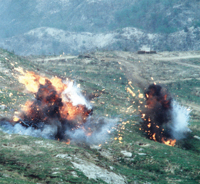 Napalm bombs explode during a live-fire exercise, 1984.