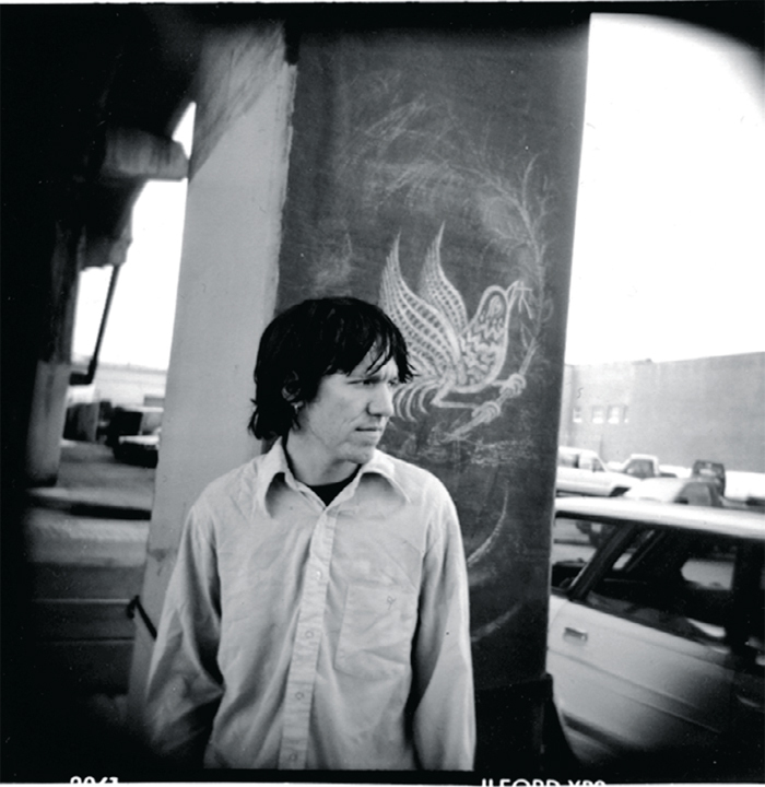 A portrait of Elliott Smith from Jem Cohen’s 1997 independent film Lucky Three.