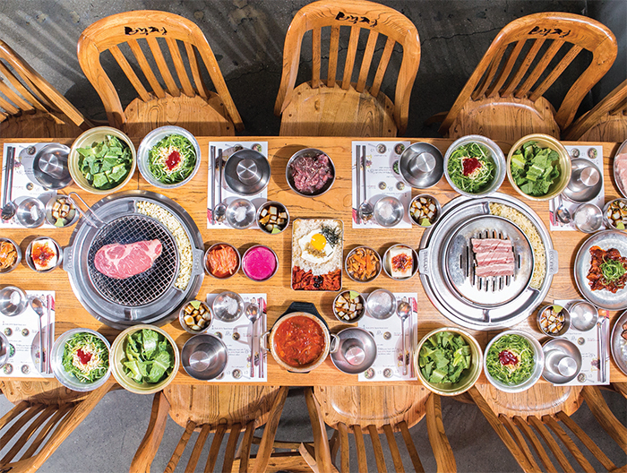 A Korean barbecue banquet at Kang Ho Dong Baekjeong restaurant in Manhattan.