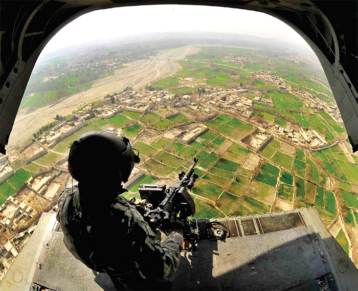 An aerial gunner, Khost province, Afghanistan, 2010. US Air Force Staff Sgt. Stephen J. Otero, Khost Prt Public Affairs/Wikicommons