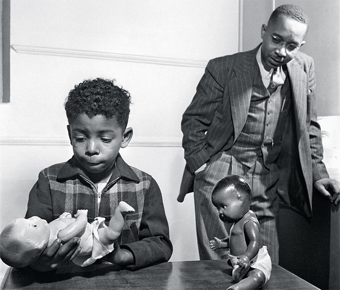 Dr. Kenneth B. Clark studying a child’s reactions to white and black dolls, 1947. © Gordon Parks Foundation, Courtesy Library of Congress