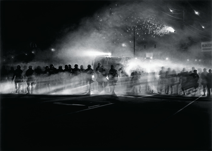 Robert Longo, Untitled (Ferguson) Diptych, 2014, charcoal on paper, 86 × 120". Courtesy Petzel Gallery.