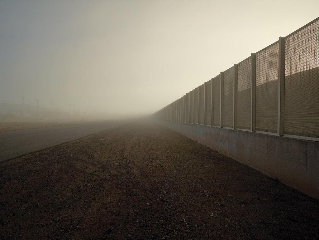 Richard Misrach, Post and Wire Mesh Fence, Douglas, Arizona, 2015, ink-jet print, 61 × 80 3/4". From the series “Border Cantos,” 2012–15. © Richard Misrach, courtesy Fraenkel Gallery, San Francisco.