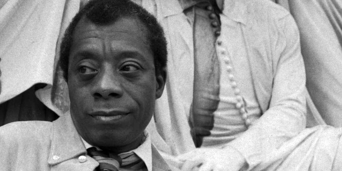 Portrait of James Baldwin with the statue of Shakespeare Albert Memorial. Photo: Allan Warren/WikiCommons