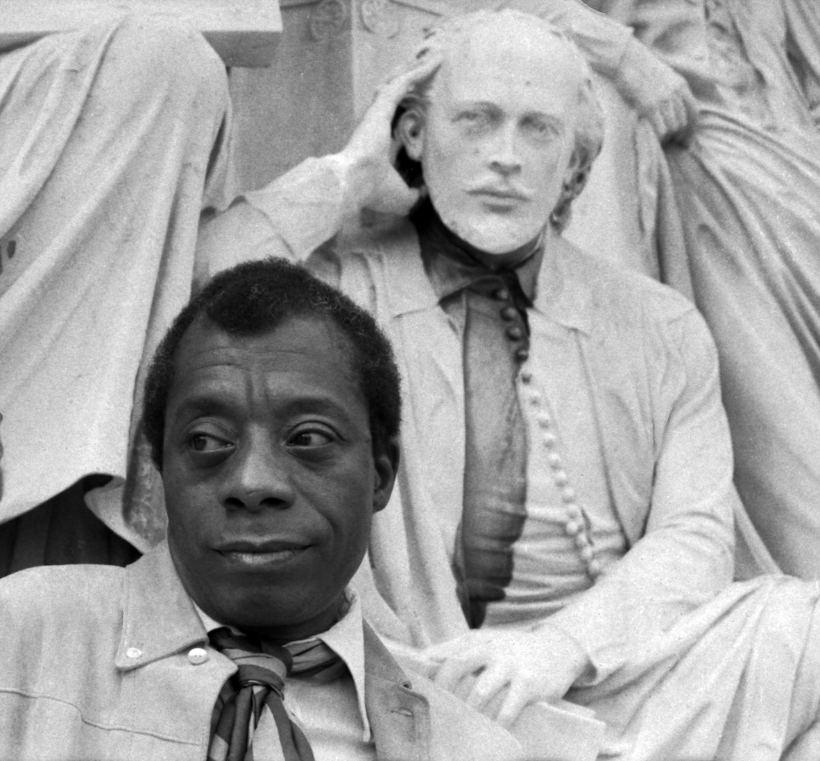 Portrait of James Baldwin with the statue of Shakespeare Albert Memorial. Photo: Allan Warren/WikiCommons