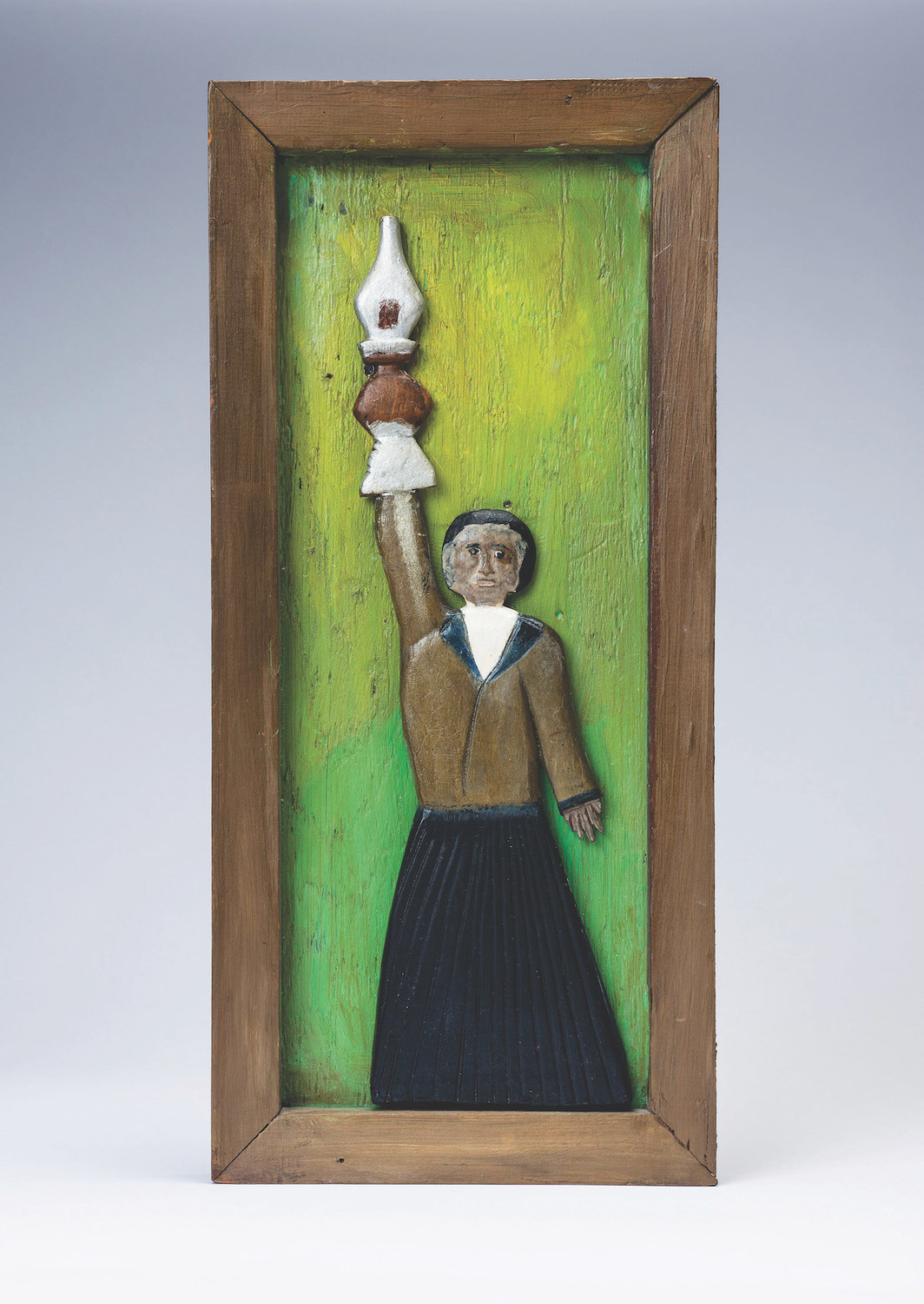 Elijah Pierce, Spreading the Light, 1933, paint on wood, 16 × 7 1/2".