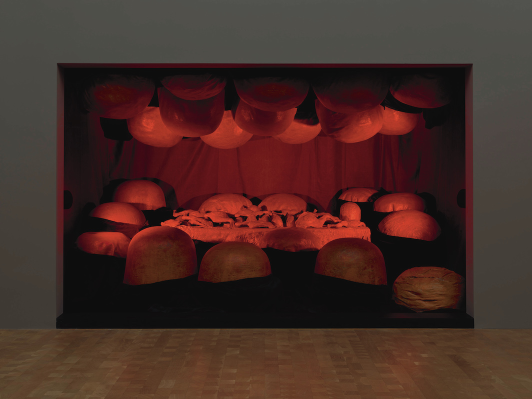 *Louise Bourgeois, _The Destruction of the Father_, 1974,* latex, plaster, wood, fabric, red light, 7' 9 5/8“ x 11' 10 5/8” x 8' 1 7/8". © The Easton Foundation/Licensed by VAGA at Artists Rights Society (ARS), New York/Collection Glenstone Museum, Potoma