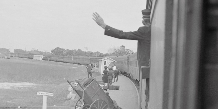 *Gordon Parks, _Trainman signaling from a "Jim Crow" coach, Saint Augustine, Florida_, 1943.* Library of Congress