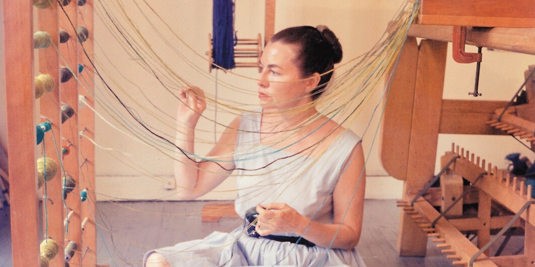 *Lenore Tawney in her Coenties Slip studio, New York, 1958*. © David Attie
