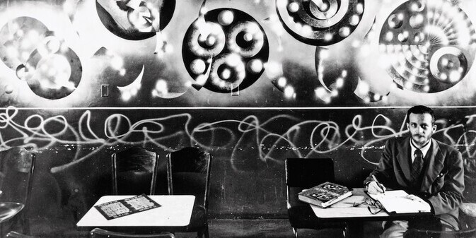 *Harry Smith with his jazz mural at Jimbo’s Bop City, San Francisco, CA, ca. 1950*. Hy Hirsh, courtesy of the Harry Smith Archives.